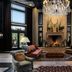 Waldorf Astoria Park City lobby with chandelier, fireplace, and large windows in Park City