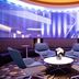 Radisson Plaza Hotel at Kalamazoo Center lobby lounge with blue chairs and round table, Kalamazoo MI