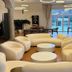 Hotel La Plantacion in Finestrat lounge with curved white seating and sea-view terrace