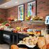 Leonardo Boutique Hotel Krakow Old Town breakfast buffet with pastries, fruit and cereal in Krakow