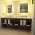 Hampton Inn & Suites by Hilton Aguascalientes Airport bathroom with double sinks and large mirror
