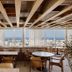 Rio Othon Palace in Rio de Janeiro lounge with city and ocean views through large windows