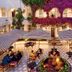 The Winchester Hotel By Newmark in Cape Town courtyard dining under striped umbrellas and bougainvillea