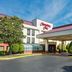 Hampton Inn by Hilton Hopewell Fort Lee exterior with covered entrance and landscaped driveway in Hopewell