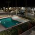 Rodeway Inn and Suites Blythe I-10 pool courtyard at night in Blythe