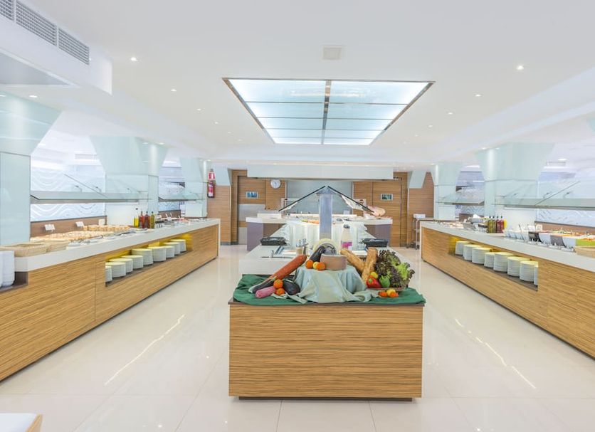Hotel Vista Park in Can Picafort breakfast buffet with central island and bright skylight dining area