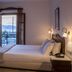 Plaza Beach Hotel in Plaka room with sea-view balcony and mountain view