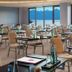 Akra V Hotel, Antalya: bright dining room with table settings and sea-and-mountain views