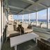 Hyatt Place Panama City Beach/Beachfront terrace with seating and oceanfront beach views