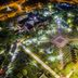 Kenyalang Suite, Miri: aerial night view of a landscaped plaza with illuminated paths and gardens