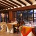 Hotel Boutique Real Casona de las Amas dining room with set tables and courtyard view in Azofra