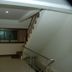 Keeree Boutique Hotel in Phetchaburi stairwell with railing and window