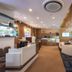 Jpark Island Resort & Waterpark in Lapu-Lapu City lobby with seating, reception desk, and wall art