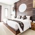Fullmoon Villa Ubud, Ubud: bright modern bedroom with king bed, floor-to-ceiling window and wood accents