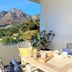 Abbey Manor Luxury Guesthouse in Cape Town balcony with mountain and garden views