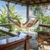 Aguila de Osa Rainforest Lodge in Agujitas de Drake with hammock and lush jungle-view deck