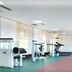Changchun Huatian Hotel gym in Changchun with treadmills, strength machines, and large windows