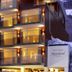 Hotel Alpenland in Sankt Anton am Arlberg with illuminated balconies and snowy alpine exterior