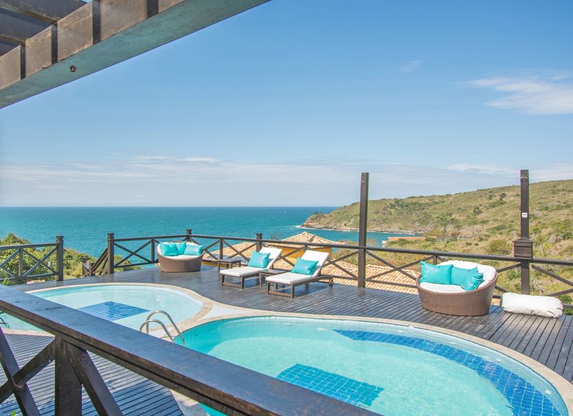 Hotel Pousada Brava Club in Búzios with a terrace pool overlooking the ocean and hillside