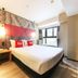 ibis Xi'an North Railway Station Hotel in Xi'an guest room with double bed and large window
