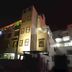OYO 3815 Hotel Jaisingh Palace in Indore at night, exterior view with lit windows and balconies