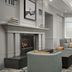 Hilton Garden Inn Tallahassee Central lounge with fireplace, seating area and chandelier in Tallahassee