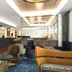DoubleTree by Hilton Hull lounge with bar seating, patterned chairs and modern lighting in Hull