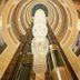 Boutique Hotel Buta, Minsk: ornate lobby atrium with a tall crystal chandelier and arched ceiling