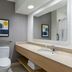 City Express by Marriott Bemidji bathroom with vanity, sink, mirror and toilet in Bemidji
