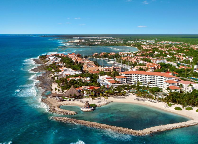 Dreams Aventuras Riviera Maya in Puerto Aventuras with a beachfront cove and oceanfront resort views
