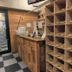 bnbplus Niigata Book Inn in Niigata, shoe rack and wooden counter in a rustic hotel entryway