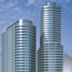 Seda Residences Makati in Manila, twin modern high-rise towers against a blue sky