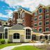 Inn at Bellefield, Hyde Park: red-brick hotel exterior with patio seating and landscaped lawn