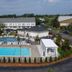 The Cove at Yarmouth by Westgate Resorts in West Yarmouth with outdoor pools and lounge chairs