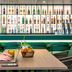Mercure Aix en Provence Beaumanoir bar lounge with bottle display and seating in Aix-en-Provence