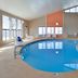 Wingate by Wyndham Beaver I-15 indoor pool with adjoining hot tub and large windows in Beaver