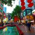 Yanjiang East Garden Inn in Guangzhou with a tree-lined pedestrian street and red lanterns