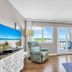 Pinnacle Port A-305 in Panama City Beach living room with balcony and ocean view