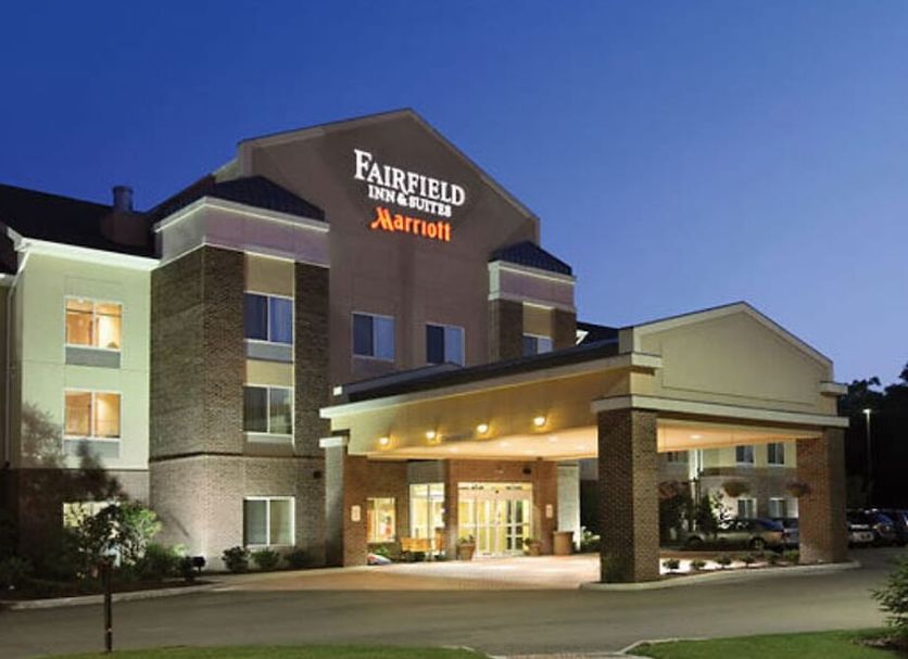 Fairfield Inn and Suites by Marriott Weirton hotel exterior at night with illuminated entrance