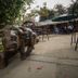 Balis Best Bar and Resort in Nairobi with a bull statue and outdoor patio seating
