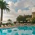 Grand Hotel Miramare in Santa Margherita Ligure with a pool, loungers, umbrellas, and hillside views