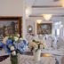 La Panoramica Hotel in Castellammare di Stabia dining room with floral centerpieces and chandeliers