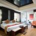 Palette Bangkok Natural Resort and Spa in Bangkok, guest room with king bed, seating area and ensuite bath