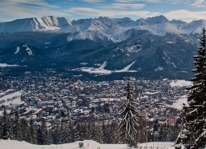 Willa Bachledowka in Zakopane with snowy mountain and town views from a hillside