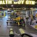 Aventree Hotel Busan gym with weight machines, benches, and cardio equipment