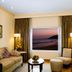 The Gateway Hotel Beach Road, Visakhapatnam suite with large ocean-view window and seating area