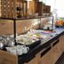 Hotel zum Rosenteich in Bad Zwischenahn breakfast buffet with pastries, fruit, juice and coffee setup