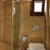 Panamare Apart Hotel Akyaka bathroom with walk-in shower, vessel sink and wall mirror