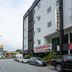 OYO 90151 Hill Inn Batu Caves exterior in Batu Caves beside a busy street and gas station