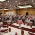 Astoria Hotel And Event Center in Dickinson banquet hall set for a large event with round tables and pink centerpieces